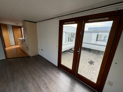 Houten chalet 10.50 x 3.80 - 2 slaapkamers - VERKOCHT