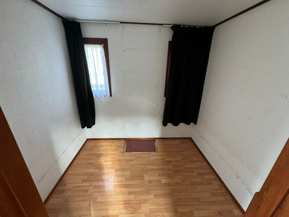 Houten chalet 10.50 x 3.80 - 2 slaapkamers - VERKOCHT