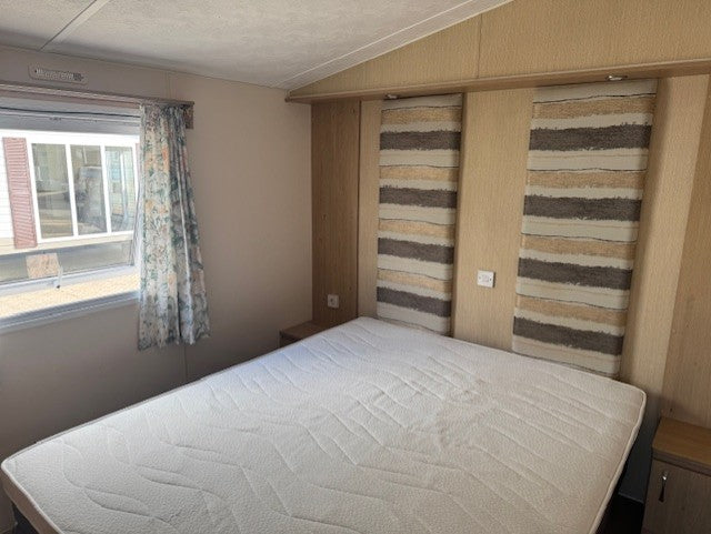 ** Kunststof stacaravan 9.00 x 3.70 2 slaapkamers 22.950,-**