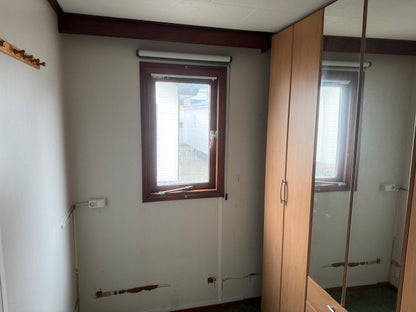 ** Canexel chalet 10 x 4 2 slaapkamers ideaal voor de handyman 8950,-**