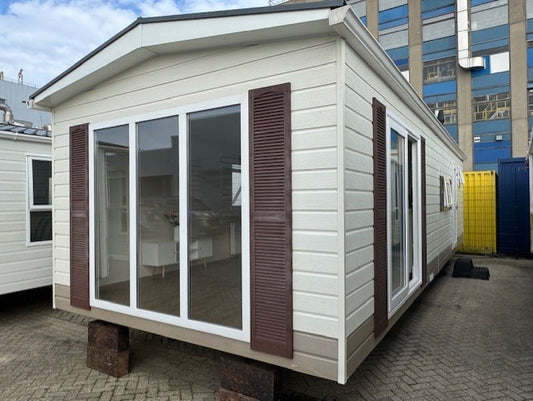 **Kunststof chalet 9.90 x 3.70 2 slaapkamers 23.750,-**